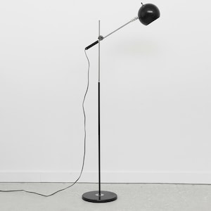Orbital Adjustable Floor Lamp