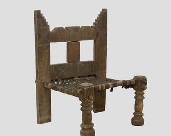 Carved Wood + Woven Leather Chair