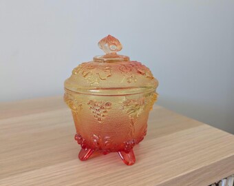 Vintage Jeanette Glass Amberina Grape & Vine pattern footed candy dish with lid