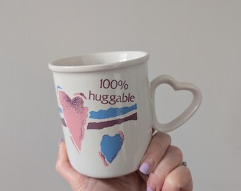 Vintage 1980s "100% Huggable" Pink and Blue Coffee Mug with heart shape handle, Retro mugs