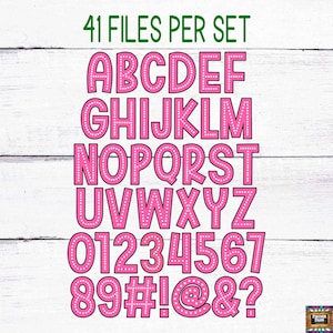 May include: A set of 41 pink alphabet and number stencils with a white polka dot pattern. The stencils are outlined in black and include letters A-Z, numbers 0-9, and symbols #, !, @, & and ?.
