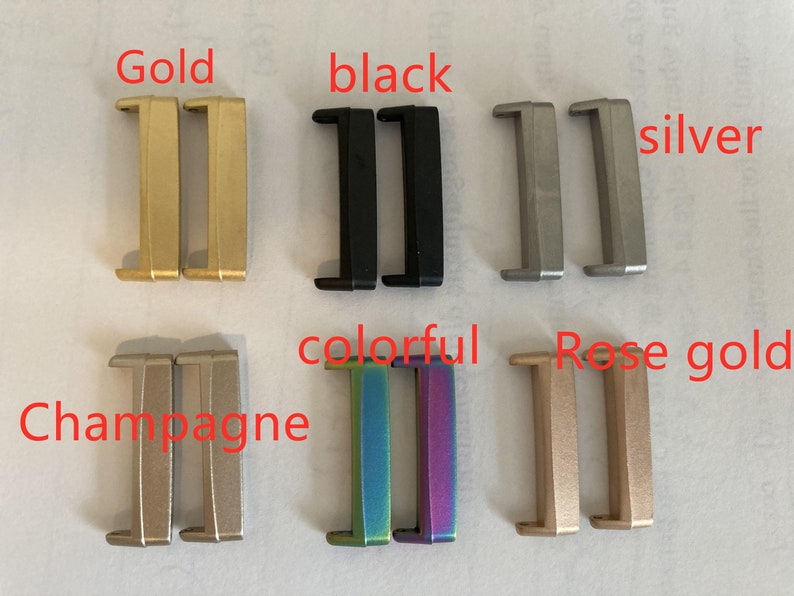 May include: A set of ten watch band buckle clasps in various colors, including gold, black, silver, champagne, colorful, and rose gold.