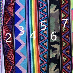 May include: Eight different colorful patterned elastic bands, numbered 1 through 8. The bands are all about 1 inch wide and have various geometric and floral designs.