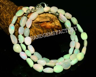 Wholesale Beads 55 Cts Weight Fire Opal Necklace 16 Inches Strand Natural Ethiopian Orange Opal Smooth Nuggets Beads 7.5x4.5-13.5x8 MM Wholesale Beads 55 Cts Weight Fire Opal Necklace 16 Inches Strand Natural Ethiopian Orange Opal Smooth Nuggets Beads 7.5x4.5-13.5x8 MM