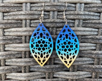 Beach vibe intricate laser cut mandala dangle earrings. Lightweight summer look earrings.