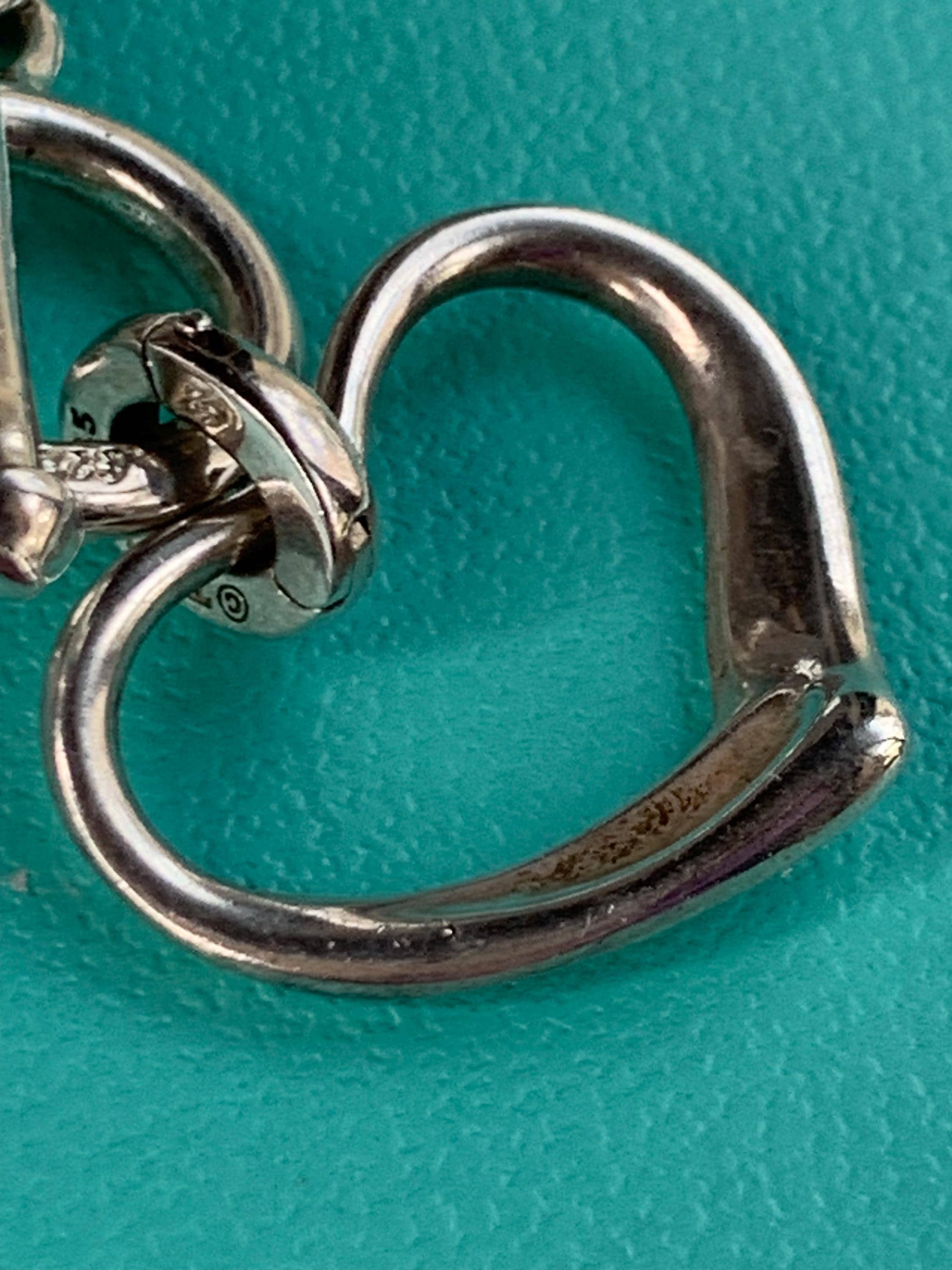 Elsa Peretti® Open Heart Pendant in Yellow Gold with Rubies