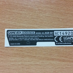 Etichetta adesiva sostitutiva per cartuccia posteriore Gameboy Advance pretagliata