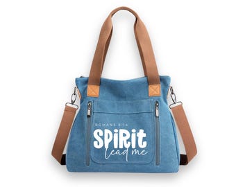 Bolso de mano con la frase "Guíame, Espíritu", con la cita bíblica Romanos 8:14.