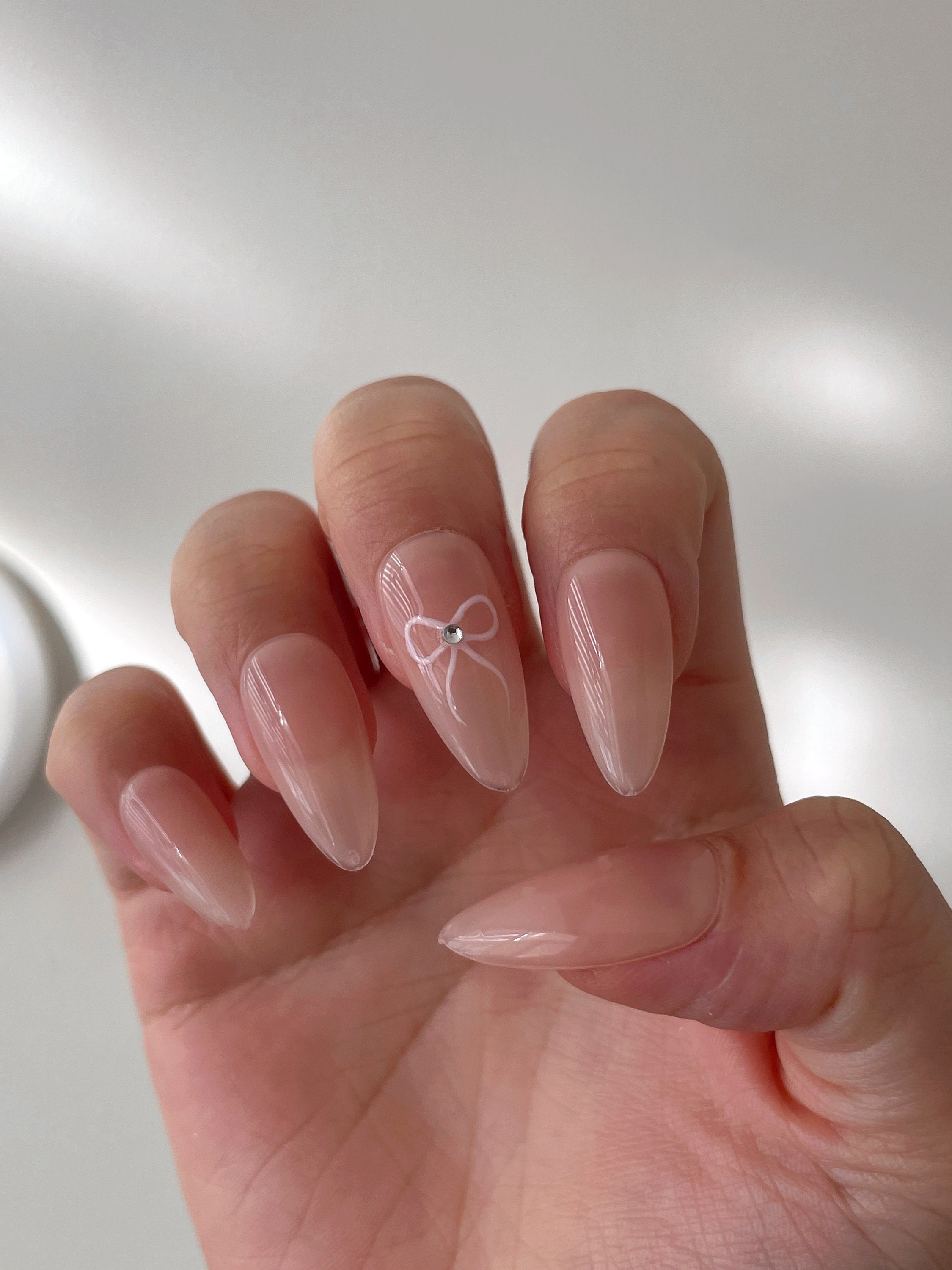 Bow Nails with Pastel Elegance