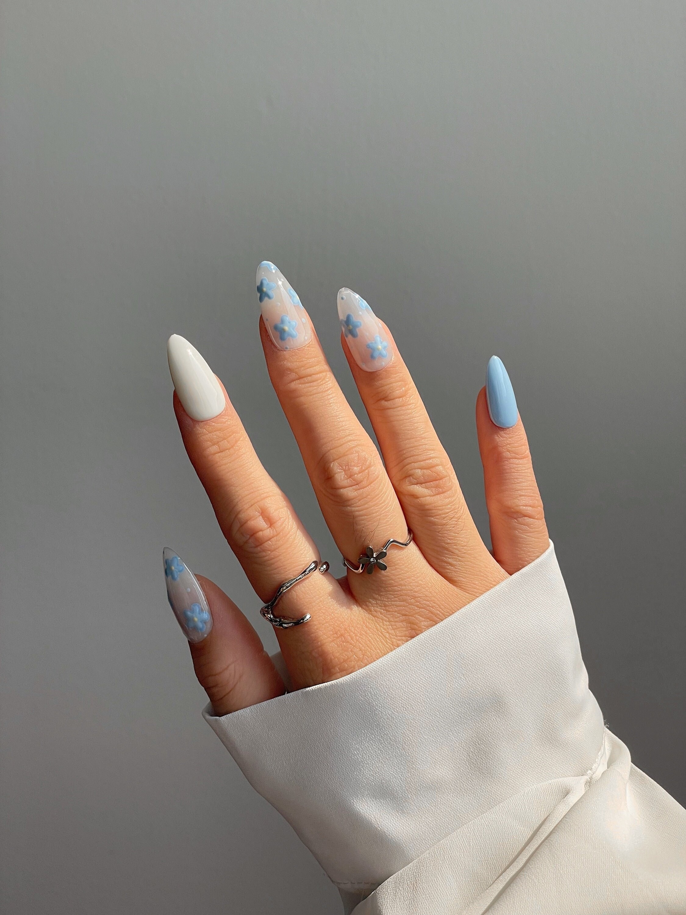 Light Blue Floral Nails with Antique Charm