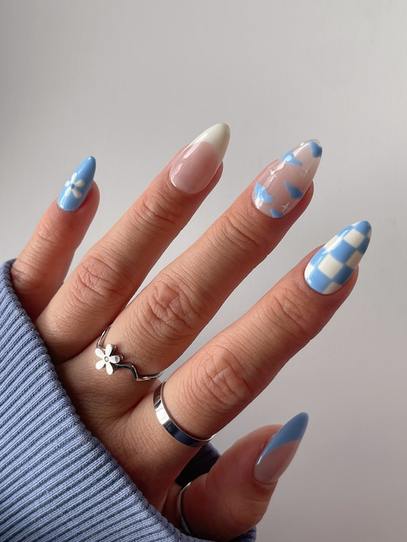 light blue nails with design
