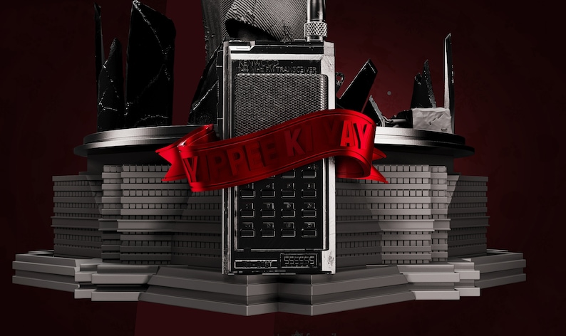 May include: A black and silver walkie talkie with a red ribbon that says "VIP KEY" on it. The walkie talkie is surrounded by a gray, futuristic-looking building.