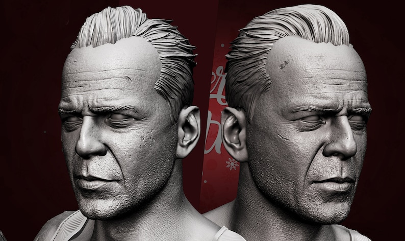May include: A close-up of a 3D model of a man's face. The model is sculpted in a realistic style, with detailed wrinkles and lines on the forehead, cheeks, and around the eyes. The man has short, dark hair and a serious expression.
