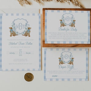 May include: A baby shower invitation with blue and white gingham pattern. The invitation features a watercolor illustration of two dogs with a monogram in the center. The text reads "Please join us in welcoming baby Michael Travis Bolton. Sip and see to be held on Saturday, October 17, 2020, two pm. 211 Gingham Lane, West Hampton, NY. RSVP to Allison at 555-555-5555."