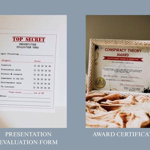 May include: Two items are displayed: a presentation evaluation form and an award certificate. The evaluation form is labeled "Top Secret" and includes scoring categories. The certificate, framed in a textured, light-colored frame, is for a "Conspiracy Theory Award."