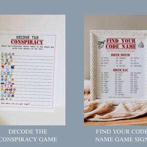 May include: Two game signs. One is a white paper with the text "DECODE THE CONSPIRACY" and a series of emojis. The other is a framed sign with the text "FIND YOUR CODE NAME" and a list of names. Both signs are on a light blue background.
