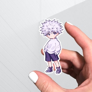 Killua character from hunter x hunter on a study table with books and  notebook