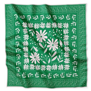 May include: A green square silk scarf with a white floral pattern. The pattern features stylised flowers and leaves.
