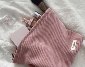 Plush pink makeup bag