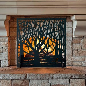 May include: Black metal fireplace screen with a tree branch design. The screen is in front of a brick fireplace with a fire burning inside.