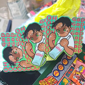 May include: A stack of stickers featuring a cartoon figure holding a vodka bottle and a cigarette. The stickers have a green background with the words "OH GOD" in pink and white. The figure has dark hair and green eyes.