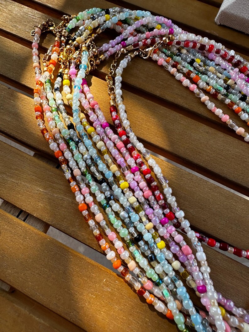 Handmade seed bead necklace with colorful beaded chain and extension