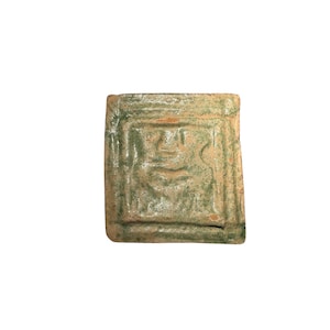 Tudor period green glazed clay tile depicting rampant wild cats, 16th century