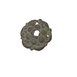 Tudor period copper rose mount, 16th century