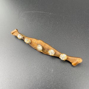Broche antigo vitoriano de cobre e strass