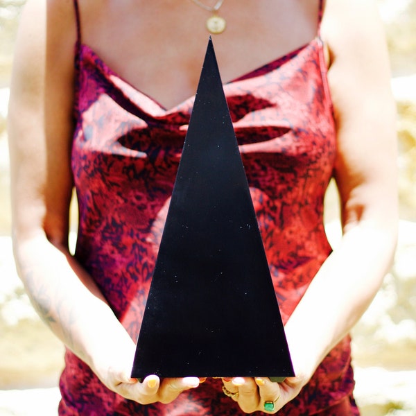 Black mirrored orgonite pyramid. Extremely powerful home EMF protecter. Experience powerful deep meditation and full uninterrupted sleep.