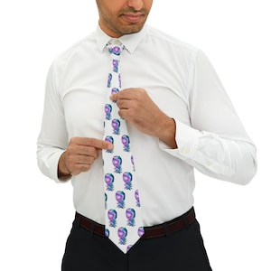 May include: A white tie with a repeating pattern of colorful, abstract, galaxy-like designs.