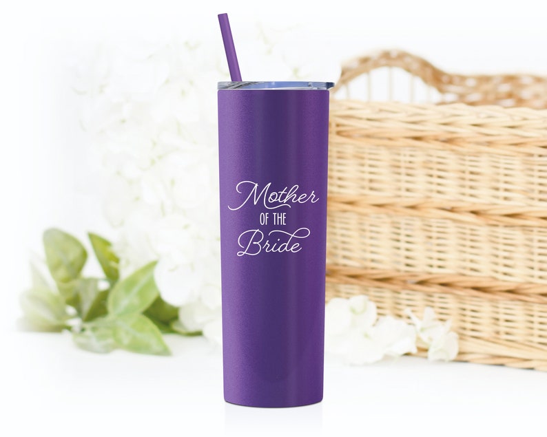 Your choice of mother of the bride gift or mother of the groom gift. 20 ounce stainless steel mother of the bride tumbler in Matte Grape (purple) with white UV print. Includes lid and matching straw. Design printed with a high quality UV printer