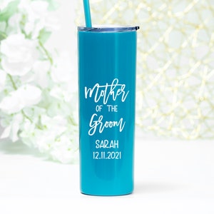 20 ounce stainless steel tumbler with Mother of the bride or groom printed on the front.  Includes lid and straw. Personalized with direct UV print. Can be personalized with name and wedding date.