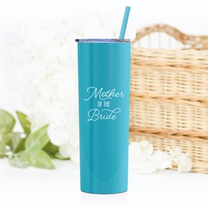 20 ounce stainless steel Mother of the Bride tumbler with lid and straw. Mothe of the bride is UV printed on the front in white print which shows well on our Matte Caribbean Cool tumbler.