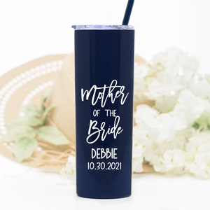 20 ounce stainless steel tumbler with Mother of the bride or groom printed on the front.  Includes lid and straw. Personalized with direct UV print. Can be personalized with name and wedding date.