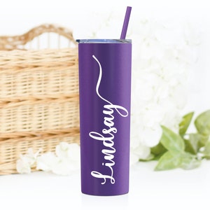 20 ounce stainless steel tumbler with straw and lid.