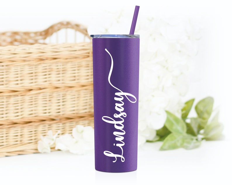 20 ounce stainless steel tumbler with straw and lid.