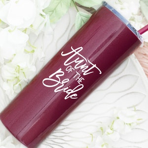 20 ounce stainless steel tumbler with aunt of the bride or groom printed on the front.  Includes lid and straw. Personalized with direct UV print.