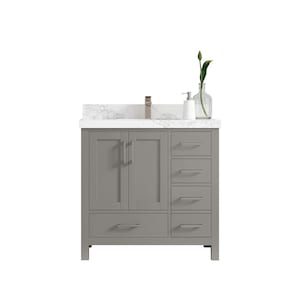 May include: A grey bathroom vanity with a white marble countertop and brushed nickel hardware. The vanity has two doors and four drawers.