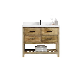 May include: A wooden bathroom vanity with four drawers and a lower shelf. The vanity has a white countertop and a black faucet.