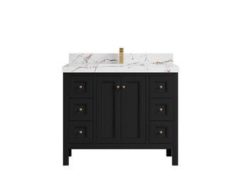 May include: Black bathroom vanity with a white marble countertop and gold hardware. The vanity has three drawers and two doors.
