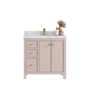 May include: A light pink bathroom vanity with a white marble countertop. The vanity has three drawers on the left and two cabinet doors on the right. Gold-colored hardware accents the drawers and doors. A gold faucet and decorative items sit on top.