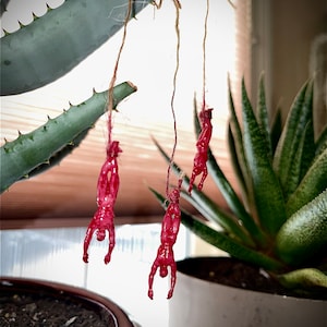 The “Predator Flex” Three Skinned Corpses Plant Decorations