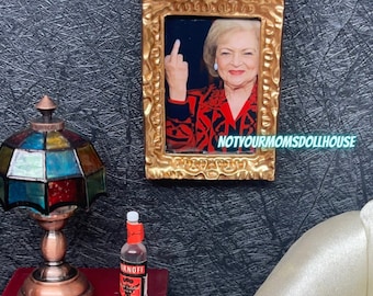 The “Betty Flipping You Off” Dollhouse Miniature Frame, Magnet or Pin