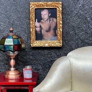 The “Phil Collins Flipping You Off” Dollhouse Miniature Frame