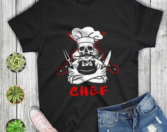 May include: Black t-shirt with a white skull wearing a chef's hat and holding crossed knives. The text "CHEF" is printed in red below the skull.