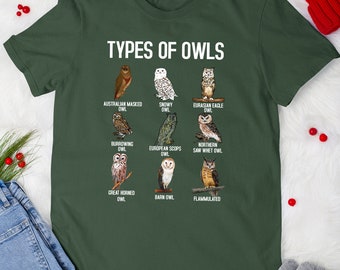 May include: A green t-shirt with the text "Types of Owls" and illustrations of different owl species, including the Australian Masked Owl, Snowy Owl, Eurasian Eagle Owl, Burrowing Owl, European Scops Owl, Northern Saw-Whet Owl, Great Horned Owl, Barn Owl, and Flammulated Owl.