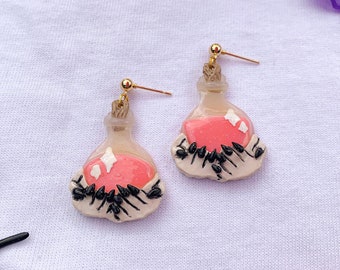 witchy love potion polymer clay earrings