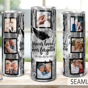 May include: A stainless steel tumbler with a memorial design. The design features a collage of framed photos, the text "forever loved, never forgotten", a feather graphic, and dates. The tumbler has a wood grain and glitter background.