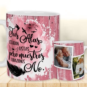 May include: White ceramic mug with a pink watercolor background and a black feather design. The mug features the text "Tus Alas Estaban Listas pero nuestros corazones No." and a photo of an older couple.